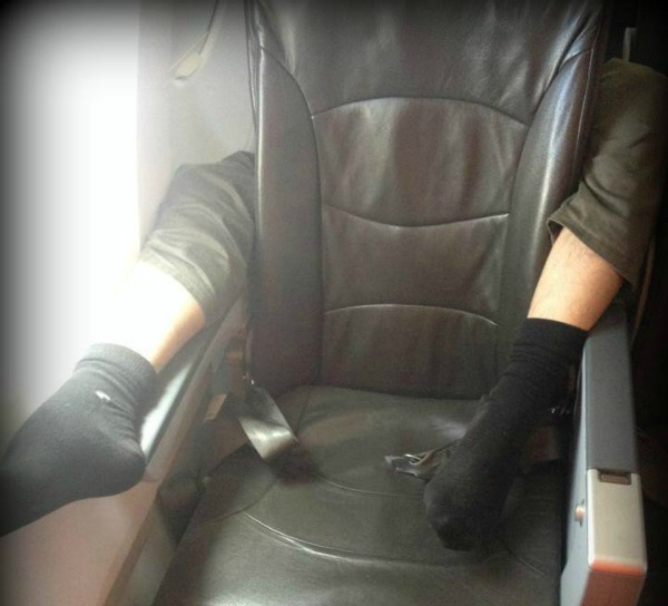 feet armrests airplane