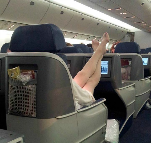 feet headrest first class