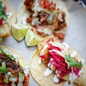 a fish taco plate with lime