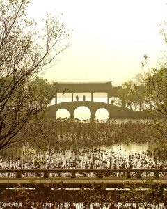 a lakeside bridge in hangzou china