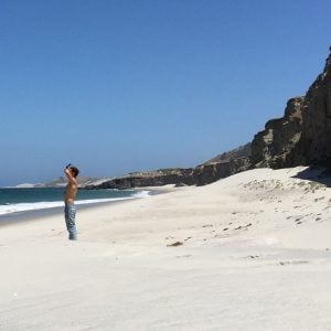 a sunbather on a white sand beach at channel islands national park california