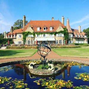 a fountain at the clubhouse of royal zoute golf club