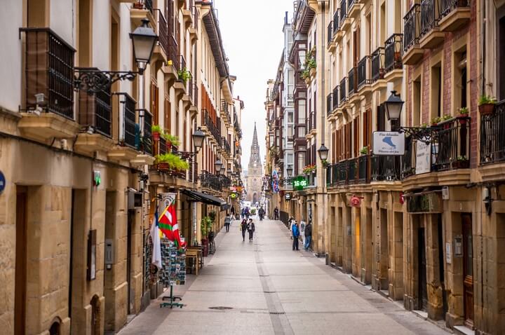 san sebastian street with church - spain